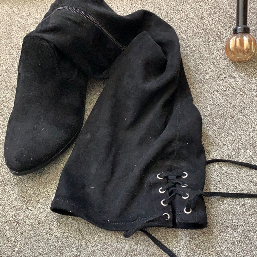 Tall black boots